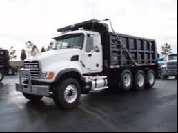 Image shows a large truck in a parking lot.